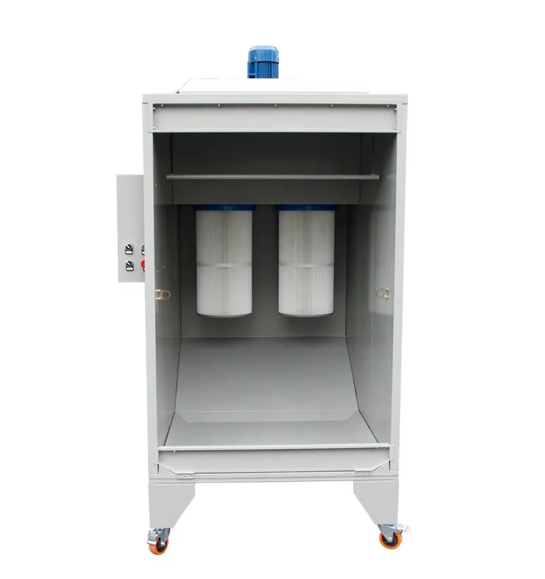 Cabine de poudrage industrielle compacte sur roulettes équipée de cartouches filtrantes et d'une aspiration.